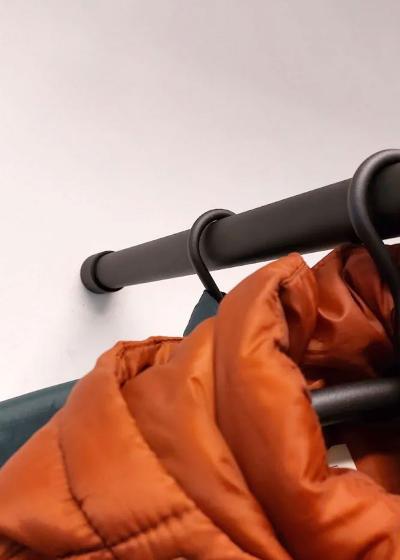 Hoeveel buigt een garderobestang door?